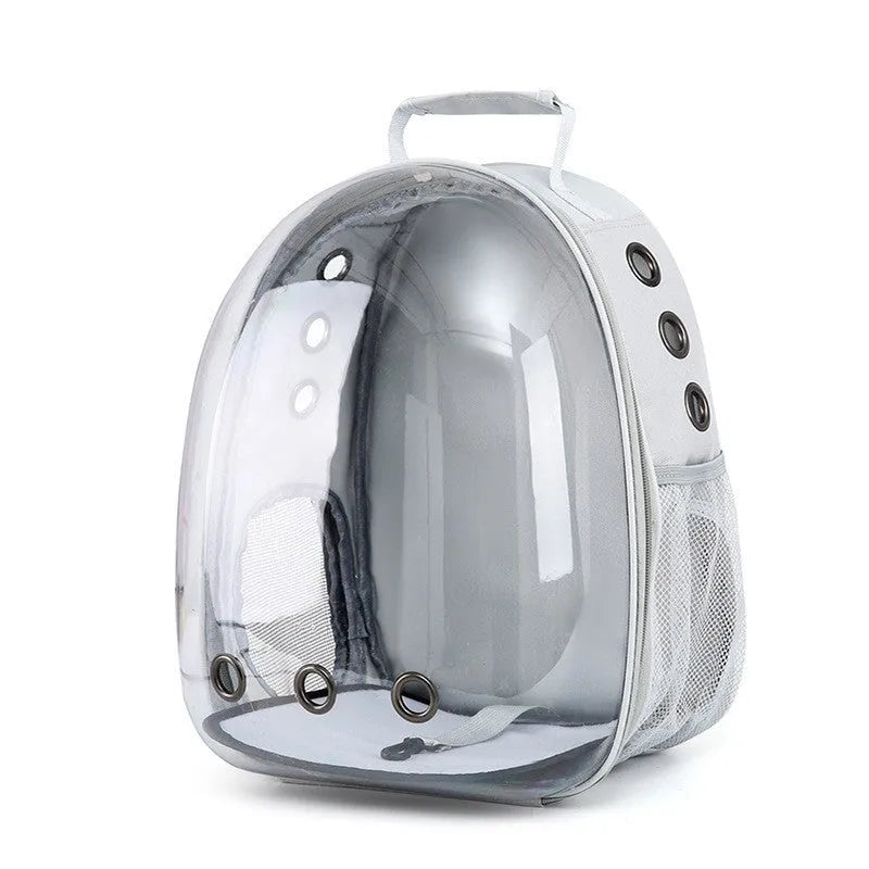 Grey hard-shell pet carrier bag with side opening for medium-sized cats or small dogs.