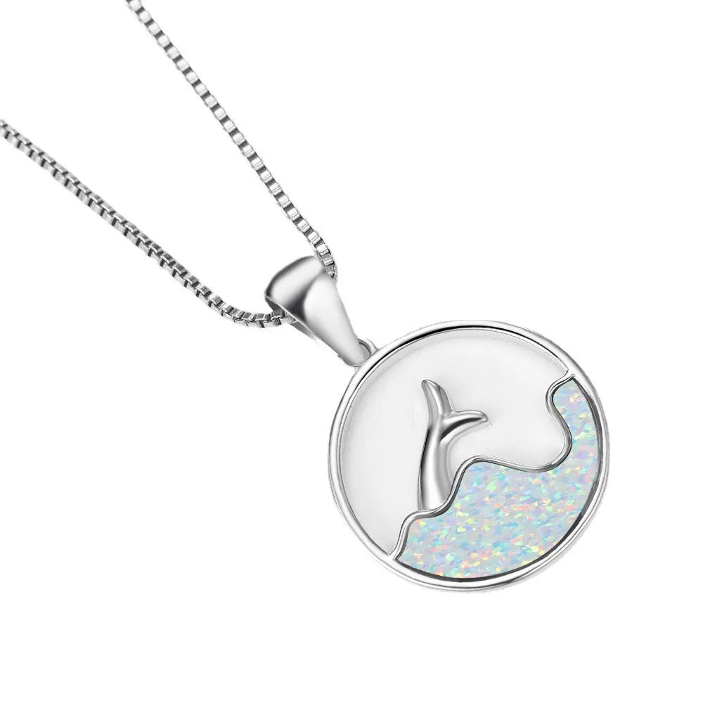 Geometric fishtail necklace with electroplated platinum opal finish on a copper base.