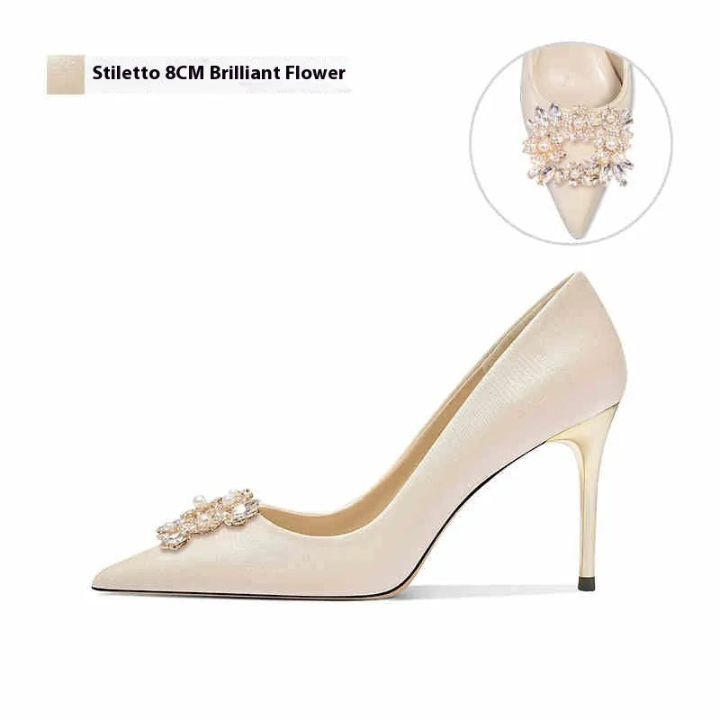 Women's pointed-toe high heel shoes with rhinestone decoration on cloth upper, showing stiletto and cat heel style options.