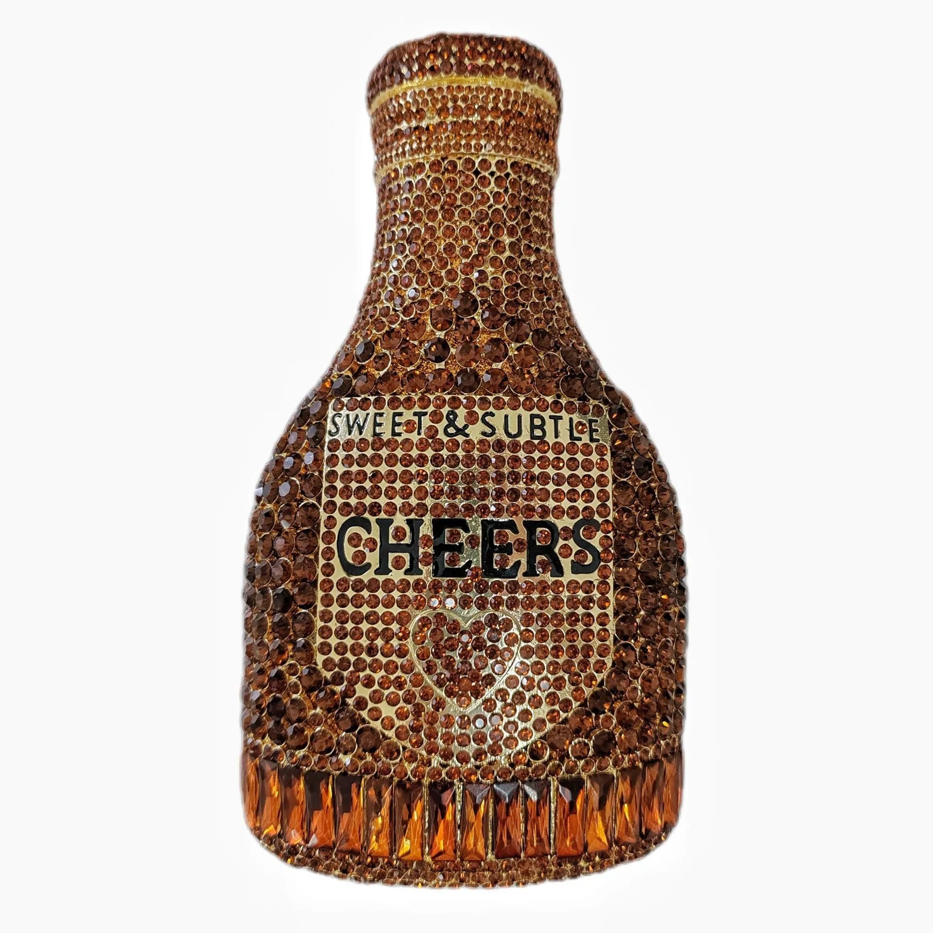 Gold hard-shell champagne bottle shaped evening clutch with rhinestones on a table.