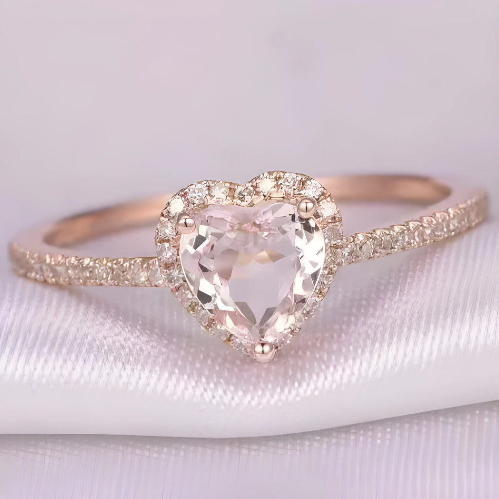 Women's heart-shaped crystal wedding ring in rose gold or silvery on white copper.