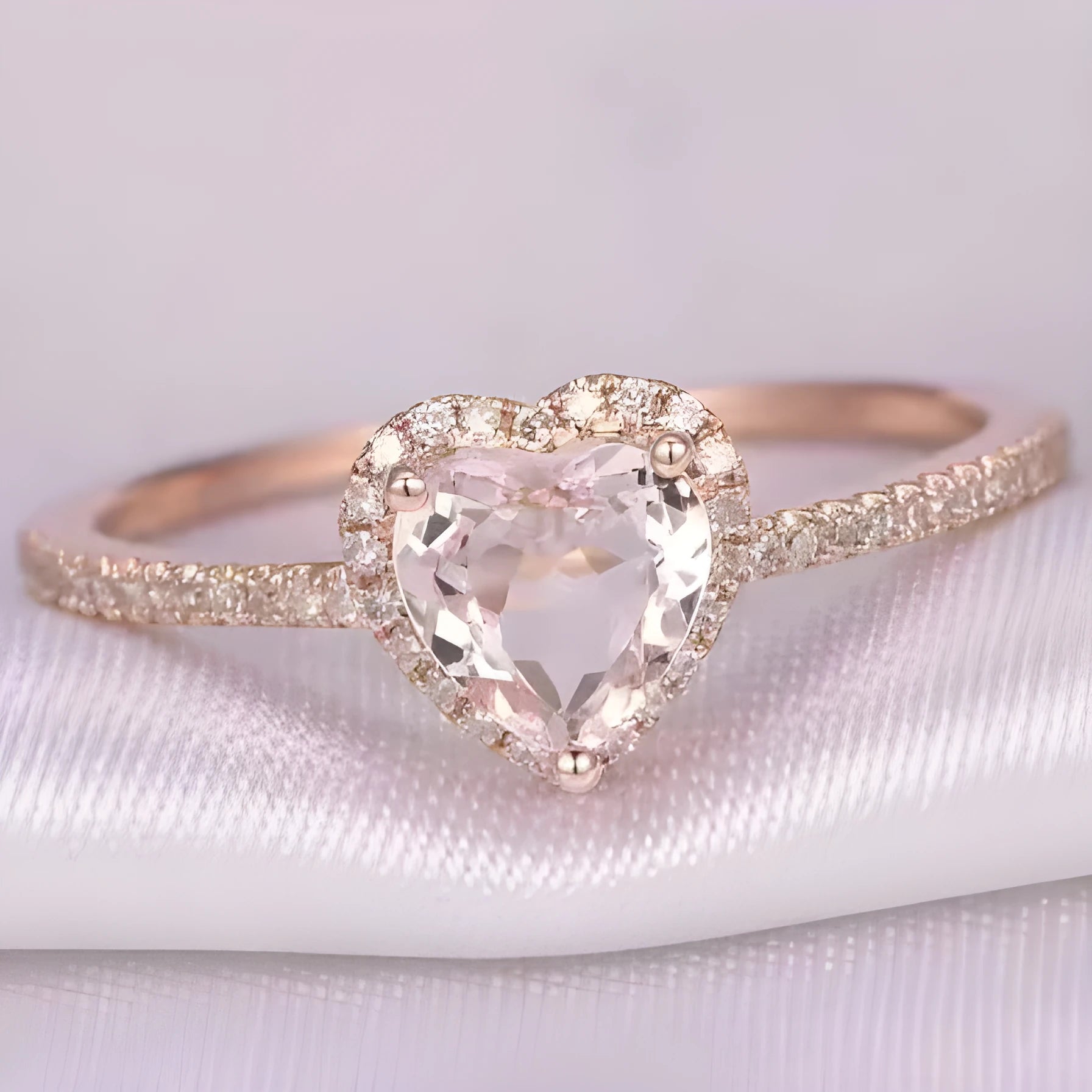 Women's heart-shaped crystal wedding ring in rose gold or silvery on white copper.