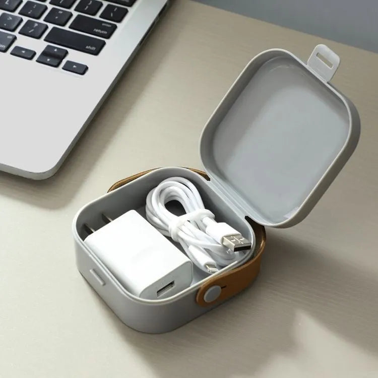 Medium polypropylene storage box with lid for organising cables and headsets, shown in Nordic White colour.