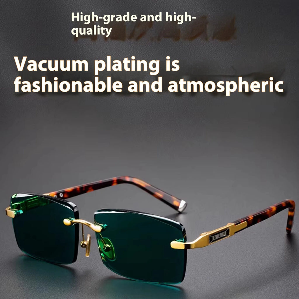 Dark green frameless crystal sunglasses shown with a glasses case and lens cloth.