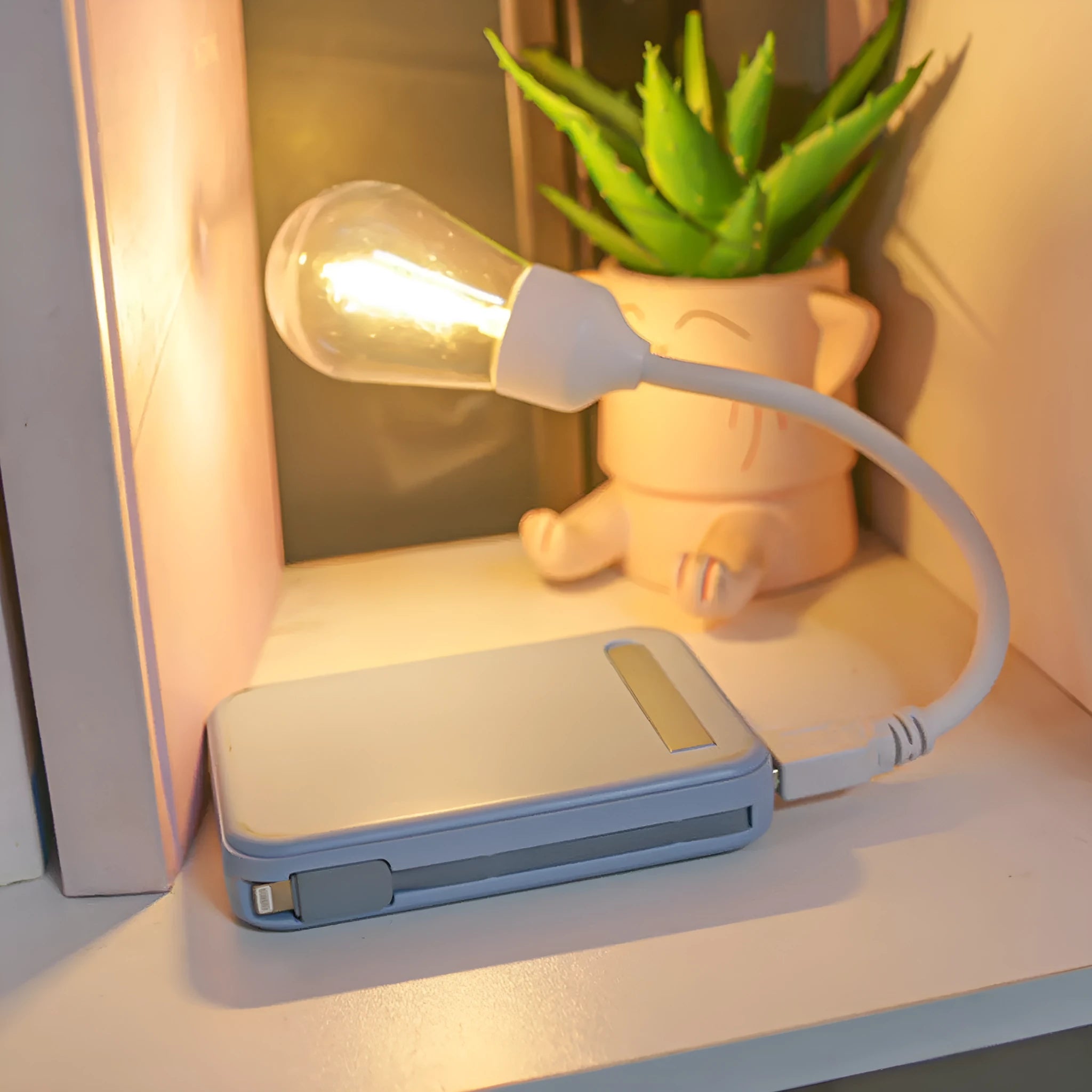 USB rechargeable folding night light with tungsten filament bulb in compact folded position