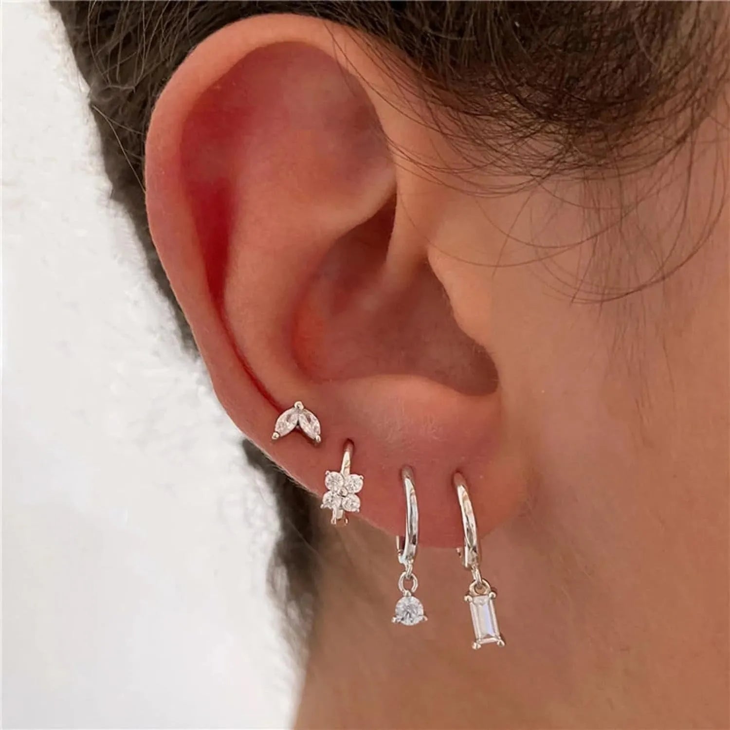 Copper electroplated geometric earring set with star designs in gold or silver tone options
