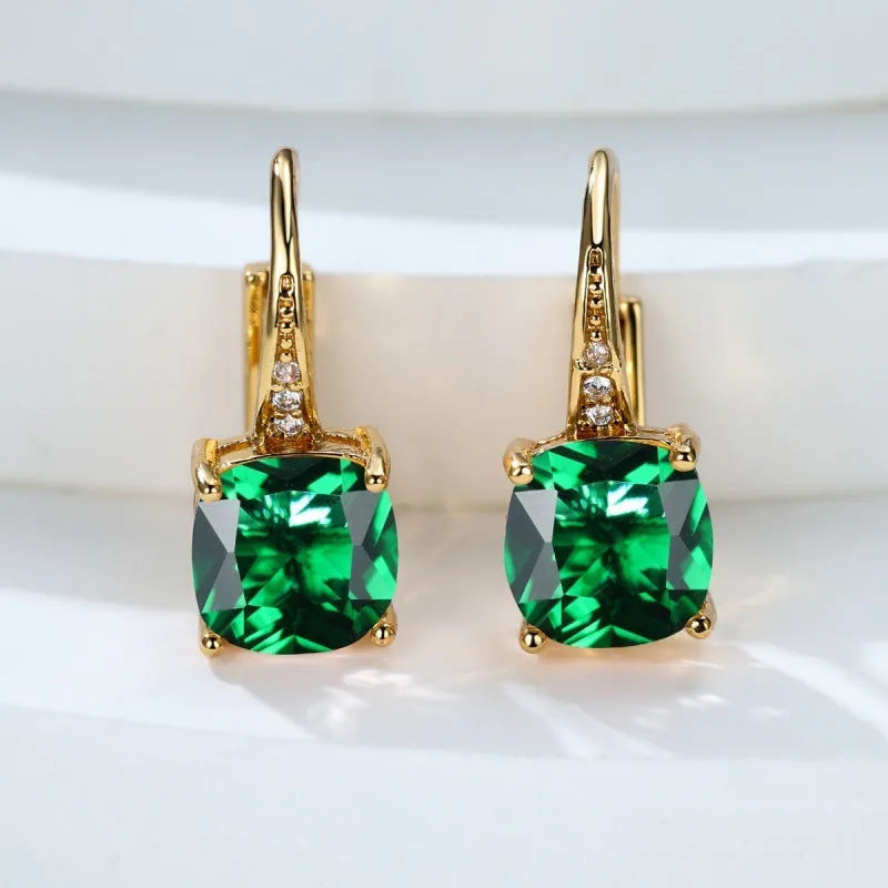 Geometric square copper ear clip earrings with moissanite inlays in a gold electroplated finish.