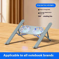 Silver aluminium laptop stand with twin cooling fans in a lifted position on a desk