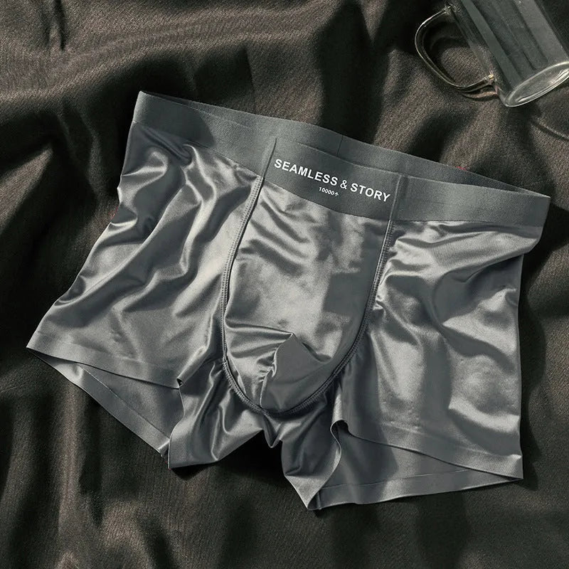 Men's mid-waist ice silk satin underwear in coffee colour showing traceless design