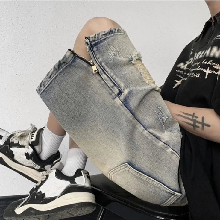 Blue denim shorts with wide leg cut and tattered retro detailing