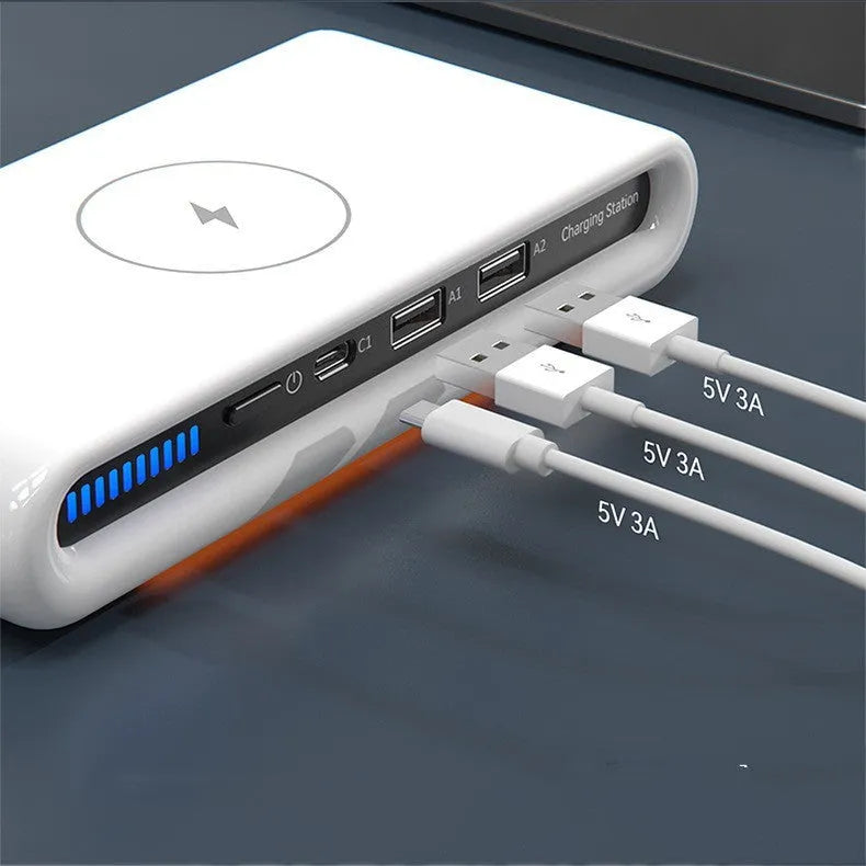 White rectangular desktop wireless charging pad with integrated multi-colour atmosphere lamp.