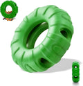 Blue natural rubber tyre-shaped dog chew toy and slow feeder on a wooden floor