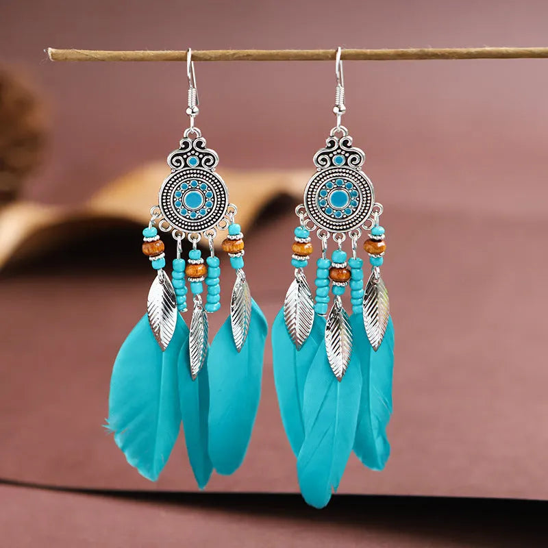 Feather pattern drop earrings with round oil craft design in alloy with electroplated finish