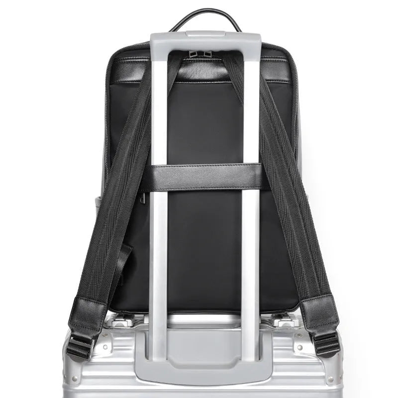 Black genuine leather men's computer backpack with woven details and ergonomic back plate