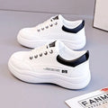 Women's white Korean-style leather pumps with cross-strap design and round toe