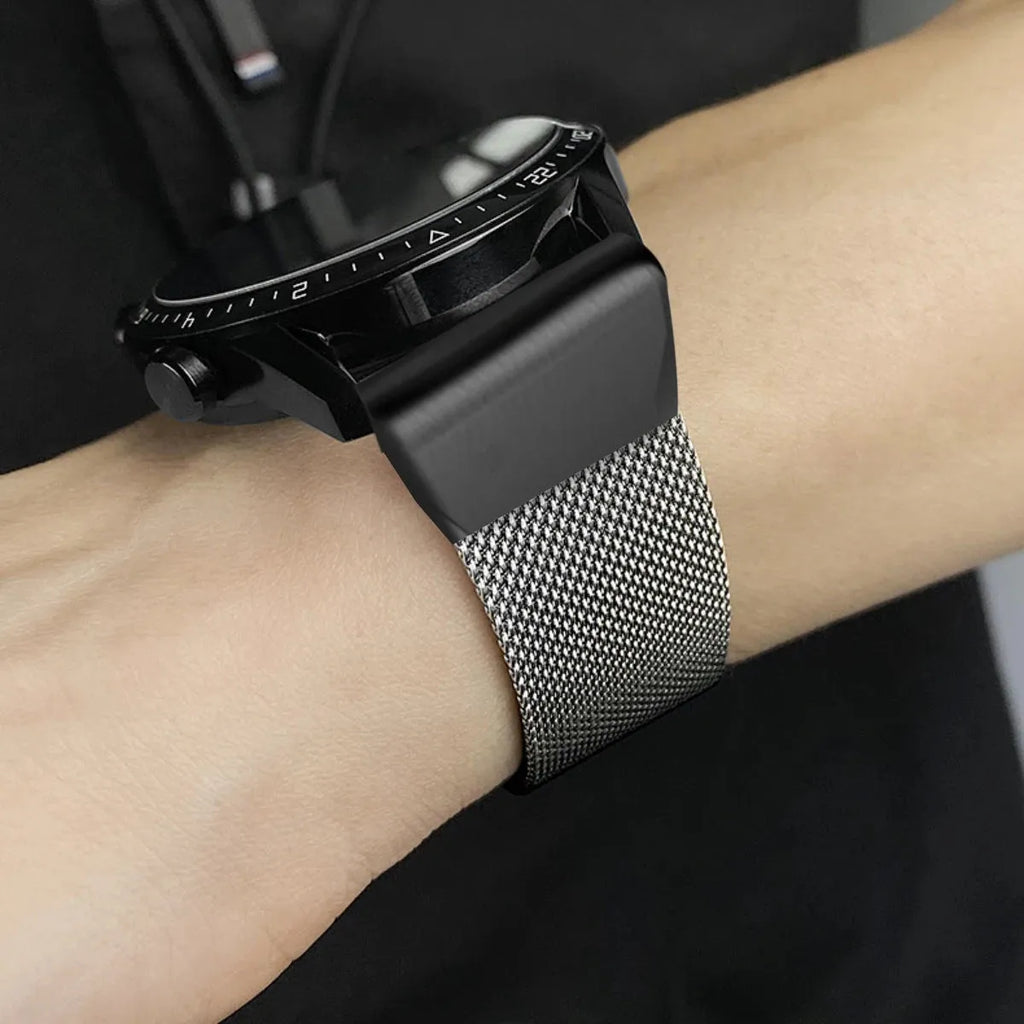 Silver stainless steel card-link watch strap for Garmin Fenix watches on a grey background.