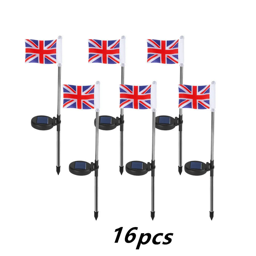 Solar garden flag light with stainless steel pole showing American flag design illuminated at night