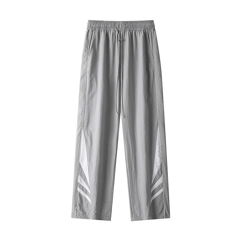 Men's grey straight-leg casual trousers with a stretch waistband on a hanger.