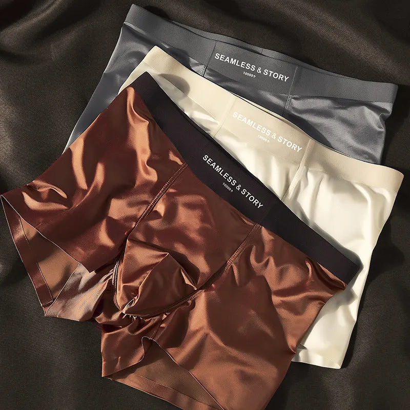 Men's mid-waist ice silk satin underwear in coffee colour showing traceless design