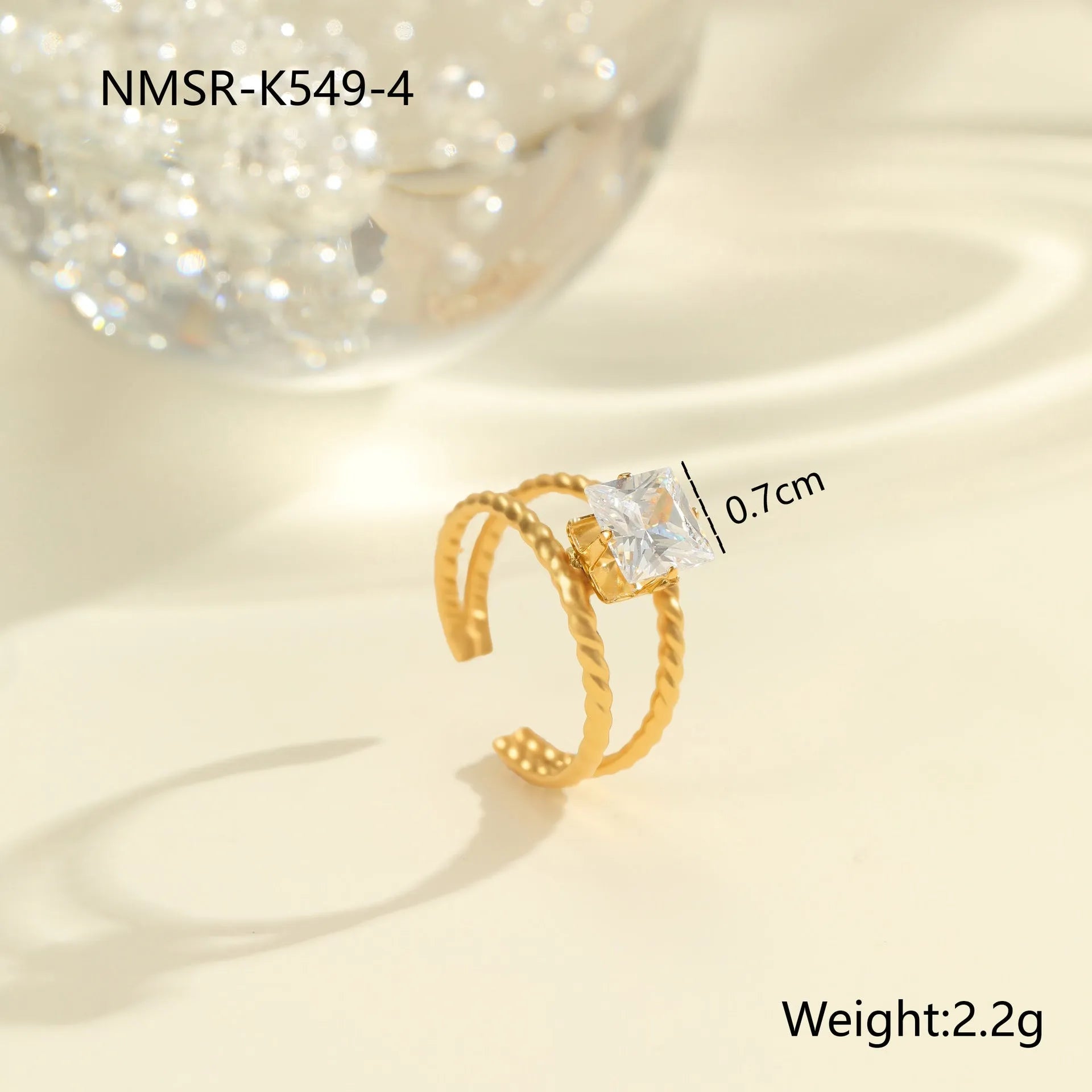 Gold electroplated stainless steel ring with zircon stones and open mouth adjustable design