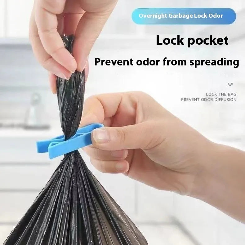 PP plastic non-slip clip for fixing a bin bag to the side of a rubbish can.