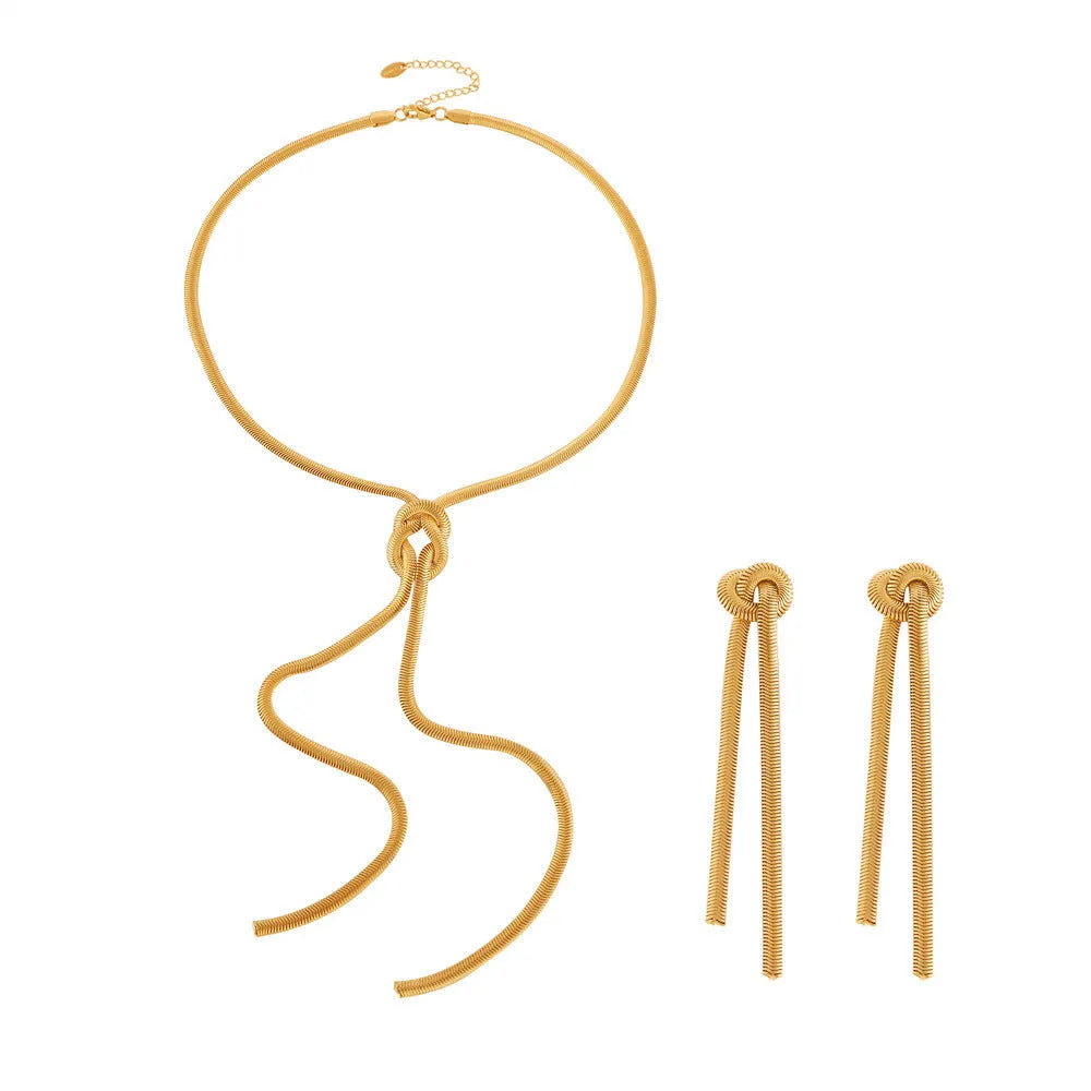 Gold electroplated titanium steel necklace and earrings set with snake chain and knotted tassel design