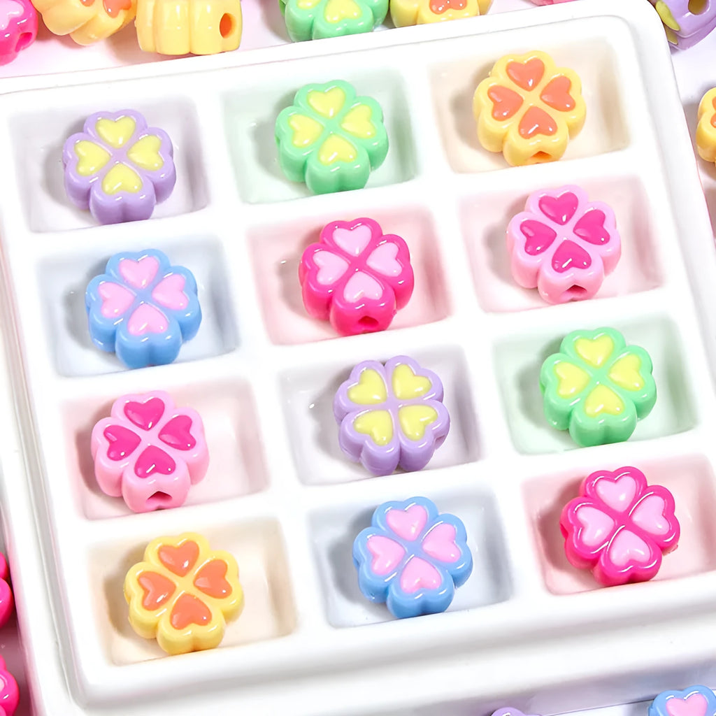 15mm acrylic craft beads with four-leaf clover shape and frosted finish in multiple colours