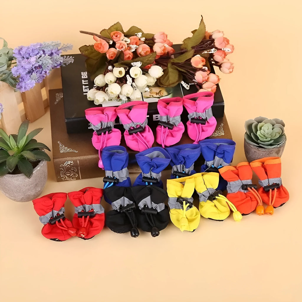 Dog shoes with soft soles in multiple colours including rose red, black, blue and monkey print designs