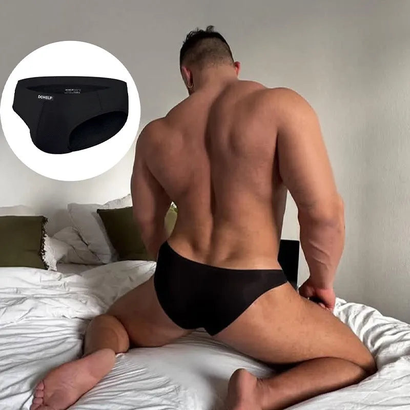 Men's solid colour low-waist briefs in seamless breathable polyester fabric