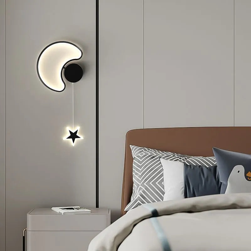 A white cloud-themed children's wall lamp with a left-facing orientation and LED light mounted on a bedroom wall.