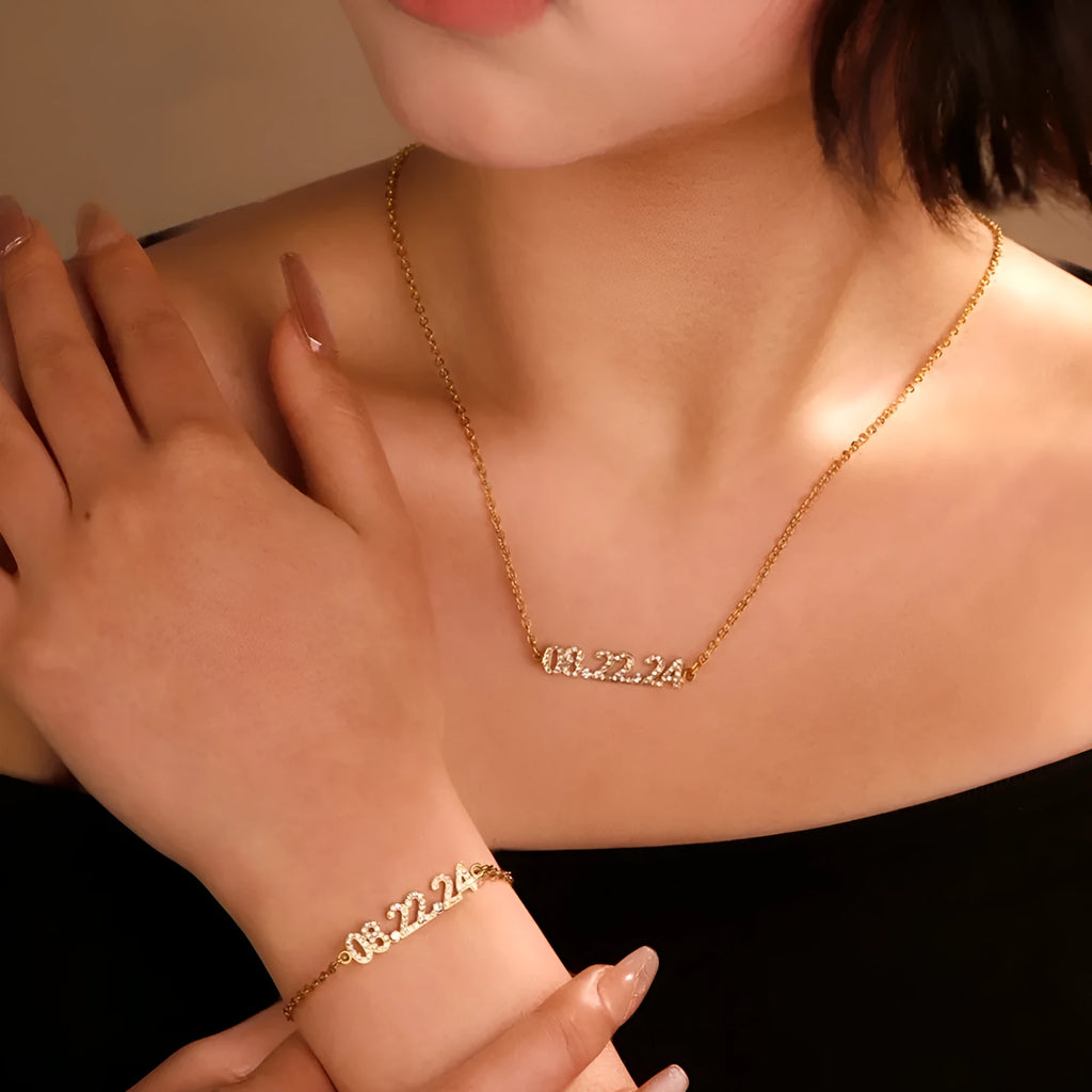 Stainless steel digital bracelet with diamond studded numbers, matching necklace option