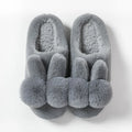 Women's fluffy rabbit fur slippers in pink with a high upper and sewn sole