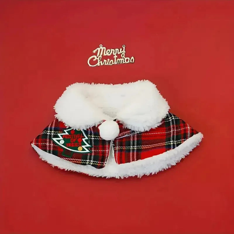 Red holiday pet scarf with bell motif wrapped around dog's neck for Christmas