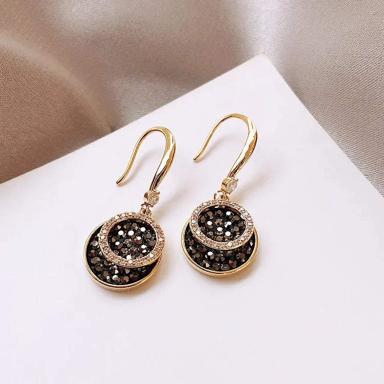 Black retro-style geometric round alloy earrings with a 3.6cm drop length.
