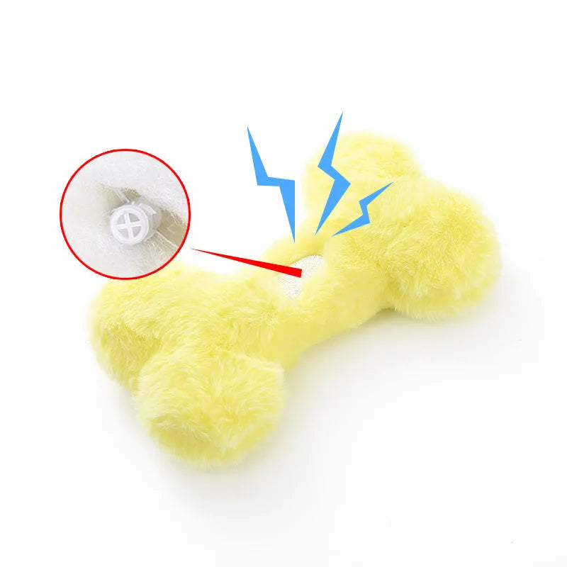 Blue plush love bone dog toy with a squeaker, shown next to pink and yellow versions.