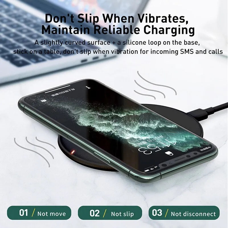 Baseus rough-textured 15W wireless charging pad for mobile phones in black on a desk.