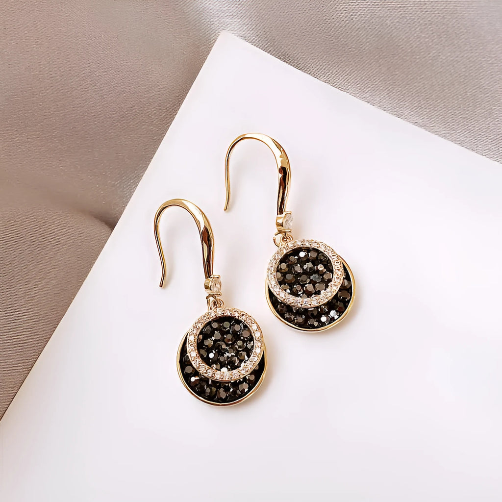 Black retro-style geometric round alloy earrings with a 3.6cm drop length.