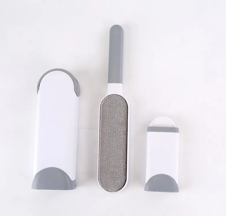 Blue reusable pet hair removal comb with double-sided flannel brush and self-cleaning base for sofas.