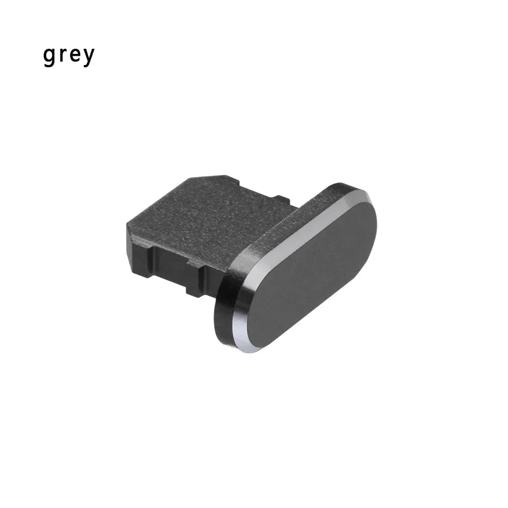 Aluminium alloy mobile phone charging port dust plug for iPhones, shown in rose gold colour.