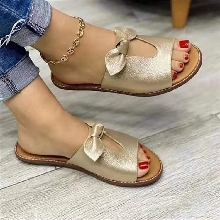 Women's black fish mouth sandals with a decorative bow on the artificial PU upper.