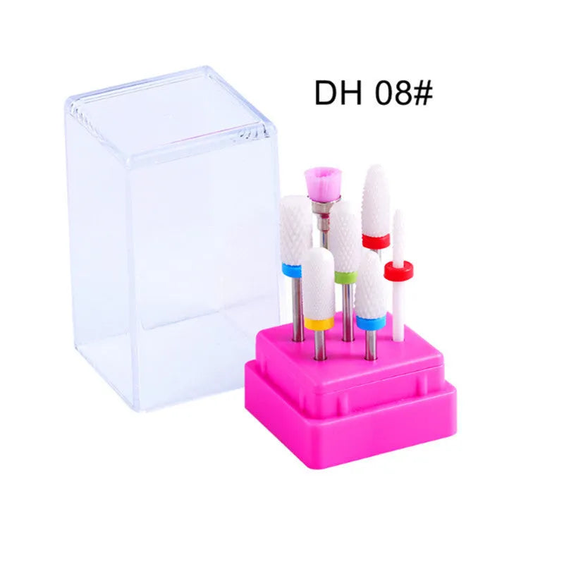Tungsten steel nail art drill bit set with six bits, one brush, in a clear case.