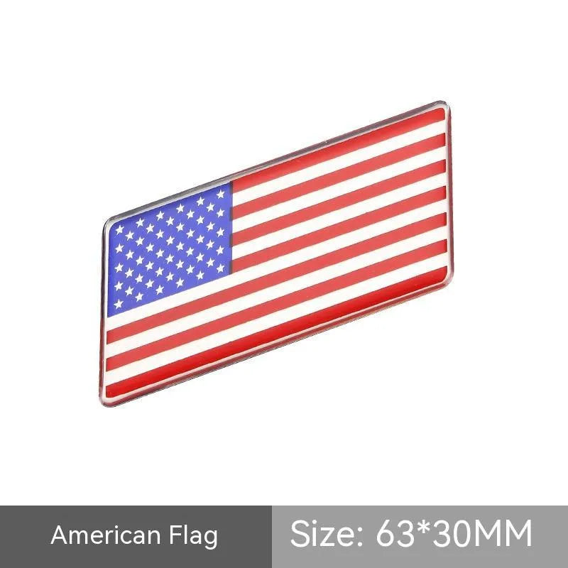 Aluminium metal car sticker with national flag design in a parallelogram shape.