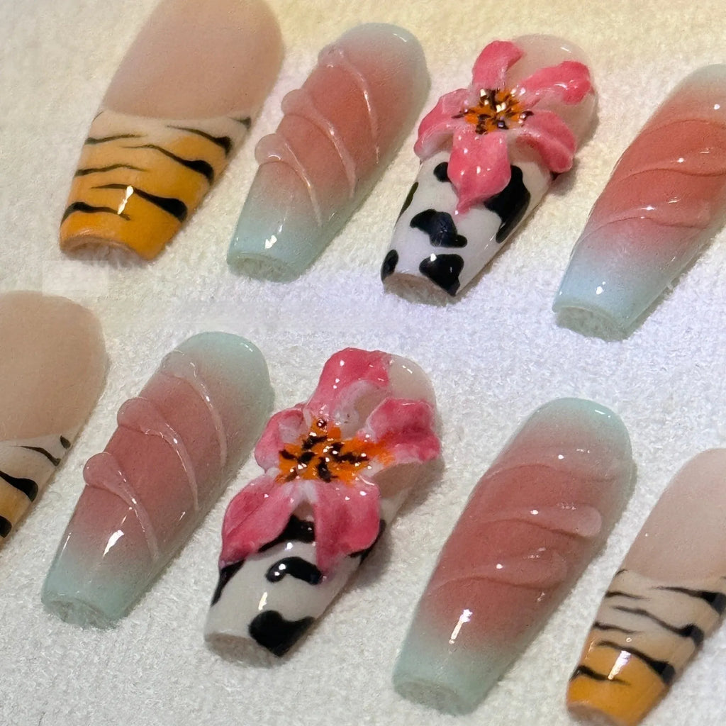 Lily hand carving nail art set with zebra patterns and embossed flowers in sizes XS S M L
