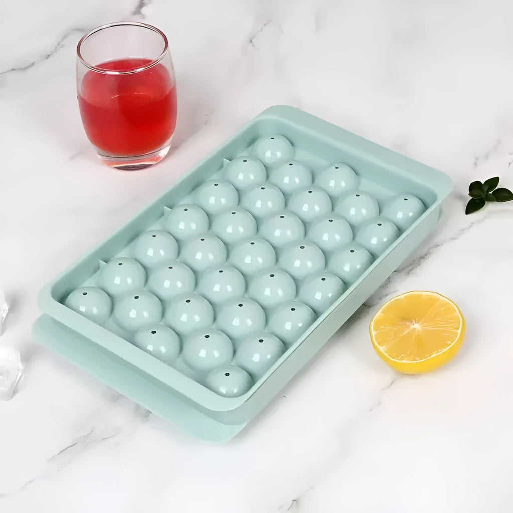 Blue silicone ice cube tray with lid showing 33 round grids for homemade ice making