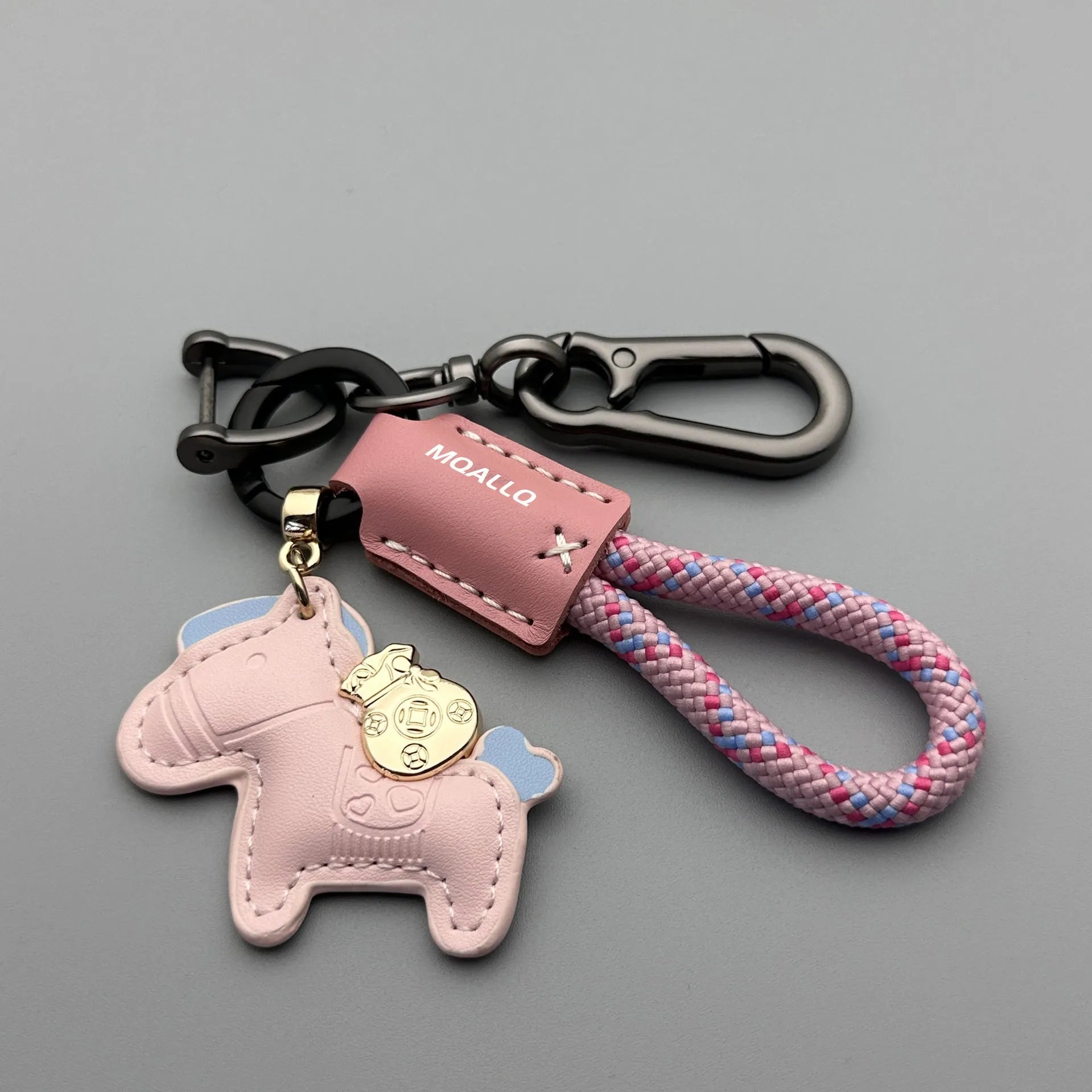 Handmade brown cowhide leather car key ring pendant with a zinc alloy belt buckle and green flanelle rope.