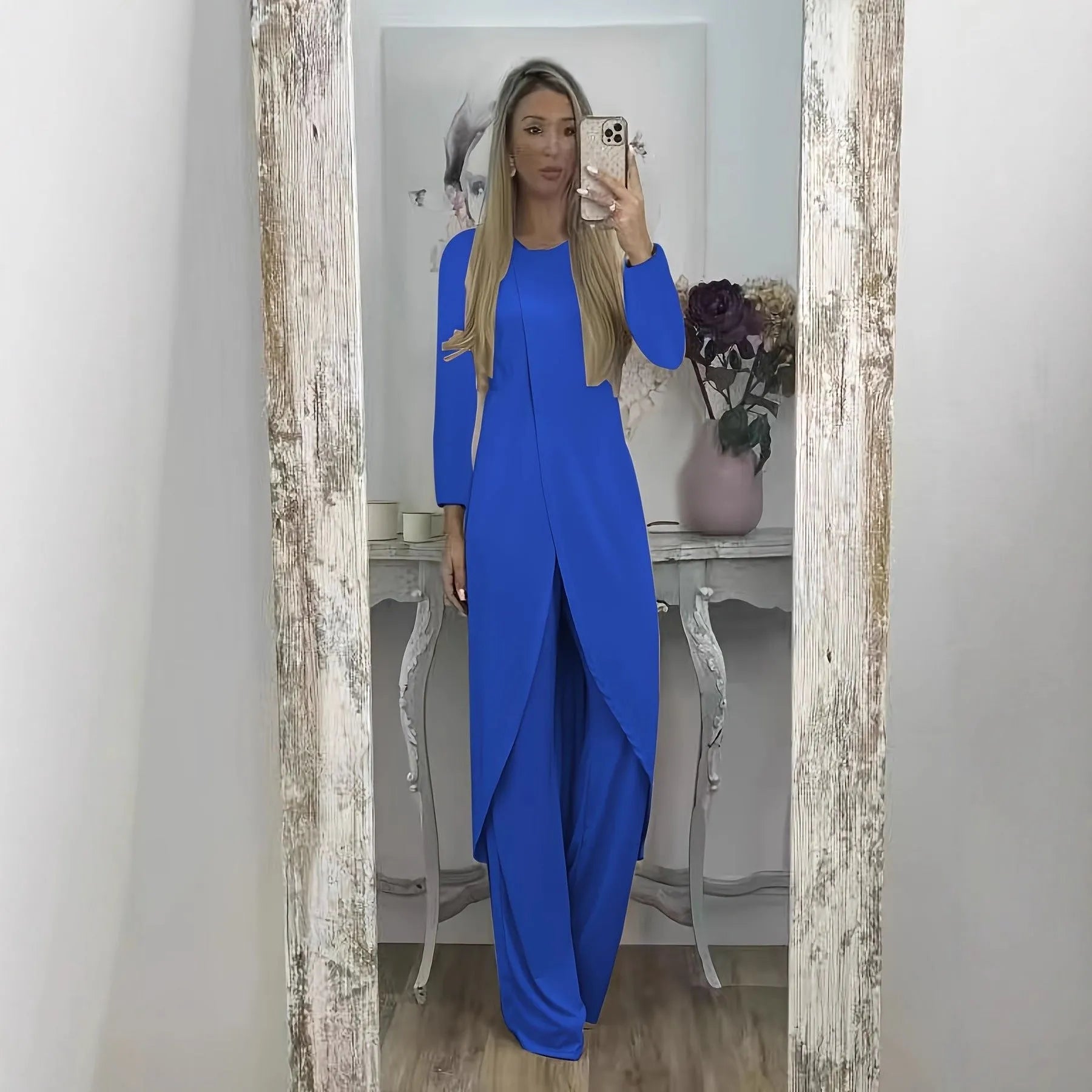 A loose-fitting long sleeve two-piece lounge set in polyester, shown in black, blue, and khaki colour options.