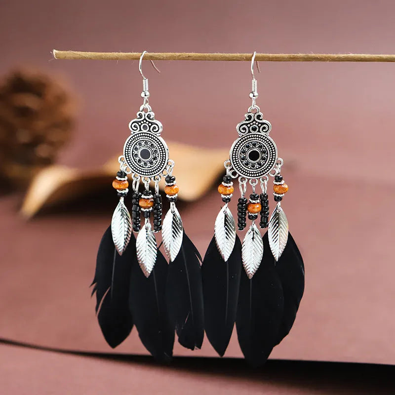 Feather pattern drop earrings with round oil craft design in alloy with electroplated finish