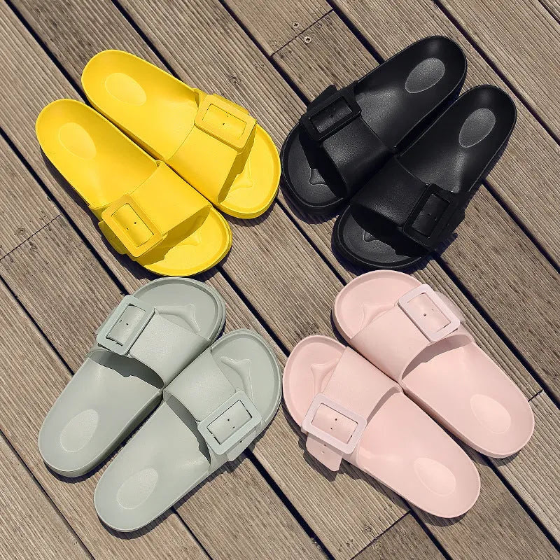 Women's grey blue flip-flop slippers with a single buckle and soft EVA sole.