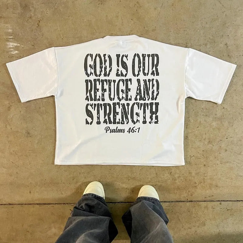 Retro style printed cotton short sleeve t-shirt with drop-shoulder sleeves on a neutral background.