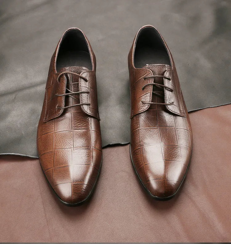 Men's black leather derby shoes with pointed toe and sewing details on antiskid rubber sole